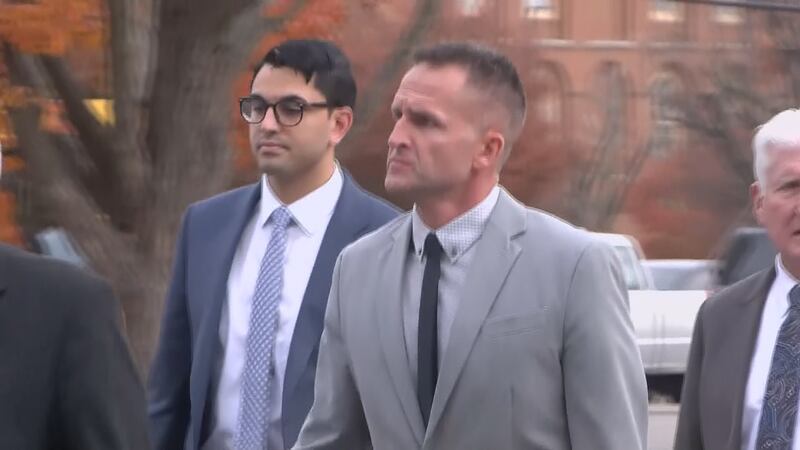 Hankison heads toward the Gene Snyder Federal Courthouse in Louisville