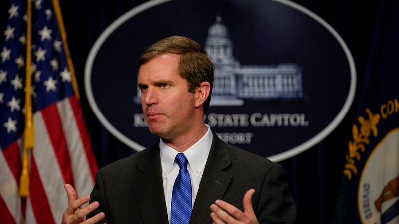 Kentucky Democratic Governor Andy Beshear speaks to the press at the Capitol in Frankfort,...